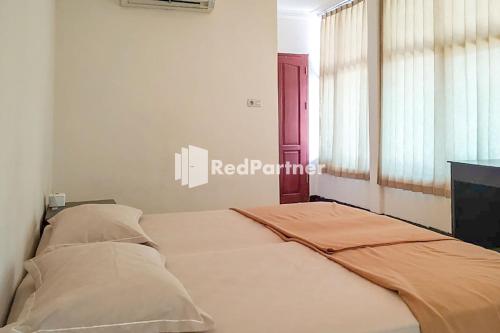 Palu City Guest House Mitra RedDoorz