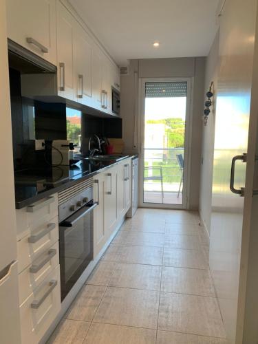 keuken, A 600 metros de la playa con piscina, ideal para familias in S'Agaro