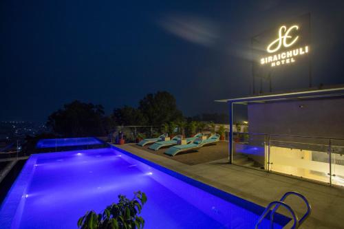 Swimming pool, Siraichuli Hotel in Chitwan