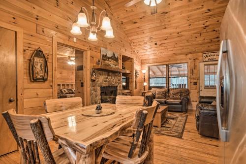 Riverfront Cabin with Hot Tub and Mountain Views!