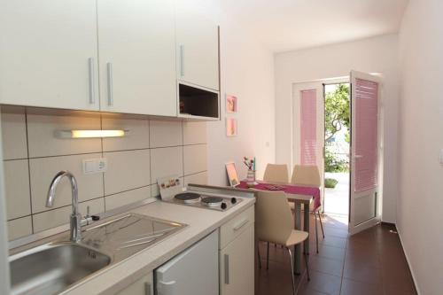 Apartment in Podgora with sea view, terrace, air conditioning, WiFi 849-3, Подгора (фото 5)