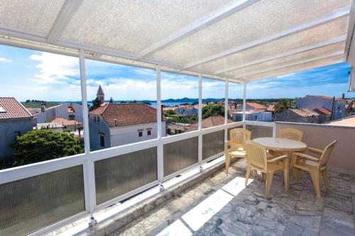 Apartment in Pakostane with sea view, terrace, air conditioning, WiFi 3475-4