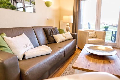 Terrasse, gratis Nutzung vom AHOI Erlebnisbad und Sauna in Sellin - Meeresblick FeWo 12, Göhren (photo 10)