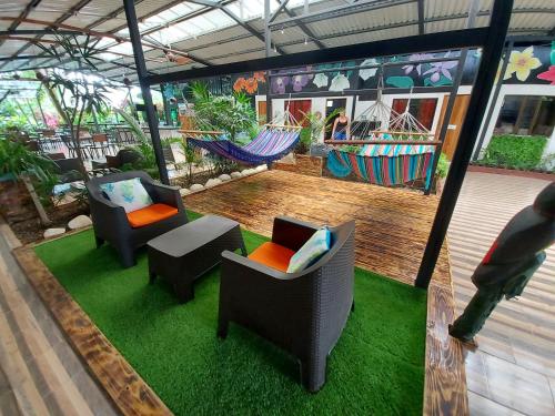 Shared lounge/TV area, Tucan Hotel in Uvita