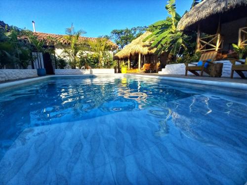 Bể bơi, Hotel Cabañas Puesta del Sol (Hotel Cabanas Puesta del Sol) in Las Penitas
