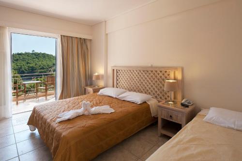 Alonissos Beach Bungalows And Suites Hotel - image 6