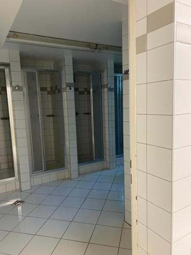 Shower, Arbeiterwohnheim Workers Dormitory Graz in Puntigam