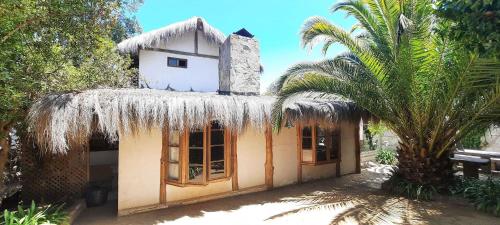 Casa en Zapallar con hermosa vista y jardín.