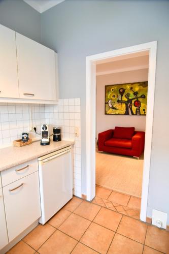 Kitchen, Penthouse Hafenblick - private Sauna - Teil der HolidayEscapes Kollektion in Travemunde