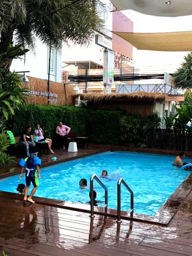 a swimming pool with people playing in it, Crystal Jade Rayong Hotel (SHA Extra Plus) in Rayong