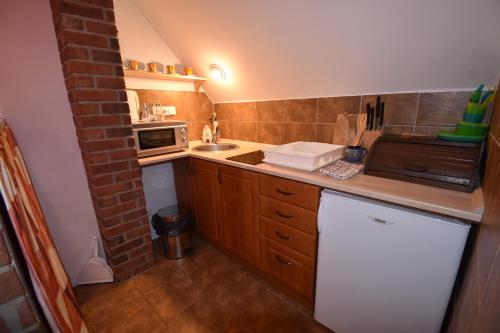 廚房, Apartmany Snezenka in 德斯特尼奧歷基克賀拉赫