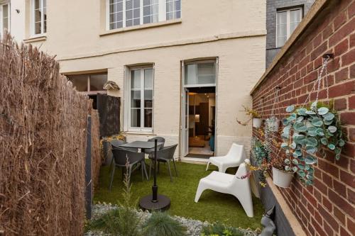 Le First, centre ville terrasse et parking