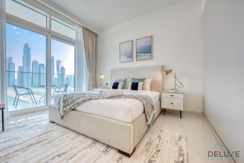 Exceptional 2BR at Sunrise Bay Tower 2 Emaar Beachfront by Deluxe Holiday Homes