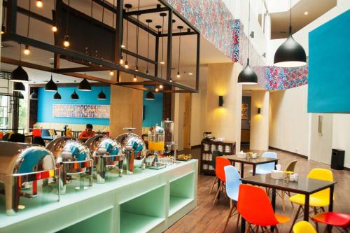 餐廳, 伊多普酒店 – 由普拉桑提酒店管理 (Idoop Hotel by Prasanthi) in 馬塔蘭