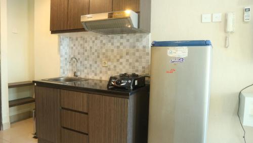 Apartemen Grand Dhika City by Cheapinn