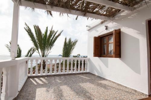 ระเบียง/ชานเรือน, Palmhouses near สนามบินแห่งชาติคาร์ปาทอส ไอส์แลนด์