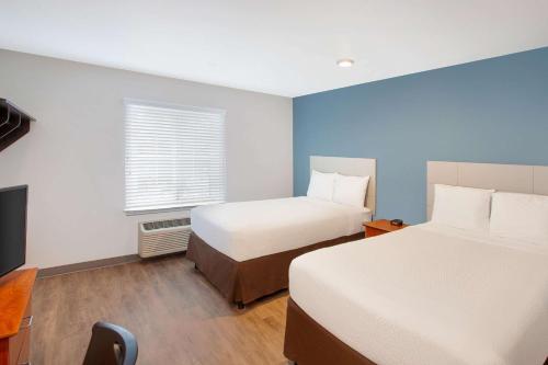 WoodSpring Suites Pharr - Tap to explore photos