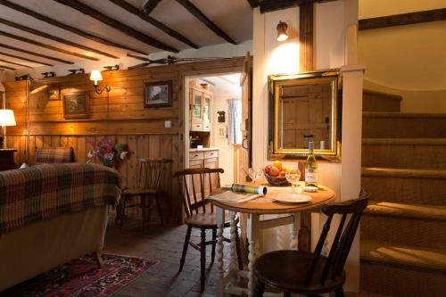 Spadgers, a flax workers cottage next to fields in a Medieval Village