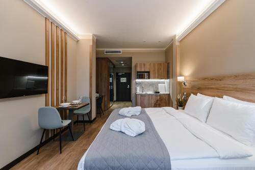 Welton club hotel & apartments - main image