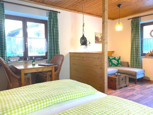 坦纳荷马豪苏尔公寓酒店