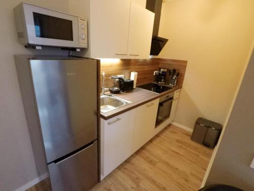 廚房, -Neubau- 24 qm Studio-Apartment in 富爾達市中心