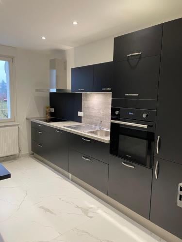 Konyha, Appartement Les Tilleuls "3 étoiles" (Appartement Les Tilleuls "3 etoiles") in Niederbronn-les-Bains