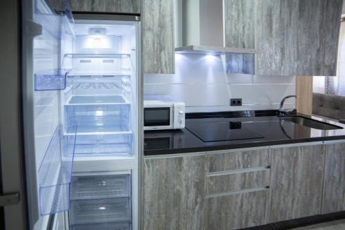 廚房, Apartamentos Maquinista in 普恩特格尼爾