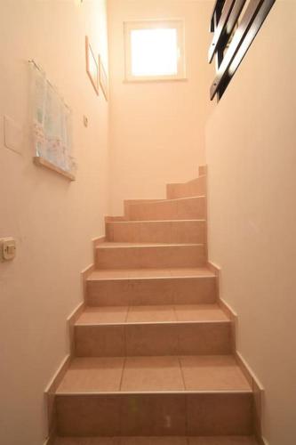 Apartment Ivo with shared swimming pool