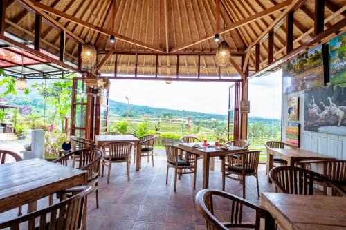 Bar/lounge, Bhuana Agung Villa and Restaurant by ecommerceloka near Jatiluwih Green Land