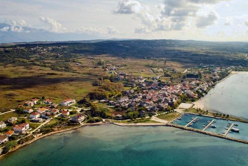 Holiday house in Ljubac with sea view, terrace, air conditioning, Wi-Fi (4851-1)
