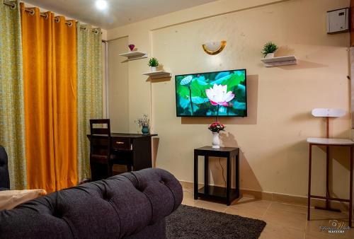 B&B Kisumu - STYLISH 1BR APARTMENT IN KISUMU: FAST WI-FI, NETFLIX, SECURE PARKING - Bed and Breakfast Kisumu