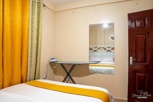 STYLISH 1BR APARTMENT IN KISUMU: FAST WI-FI, NETFLIX, SECURE PARKING