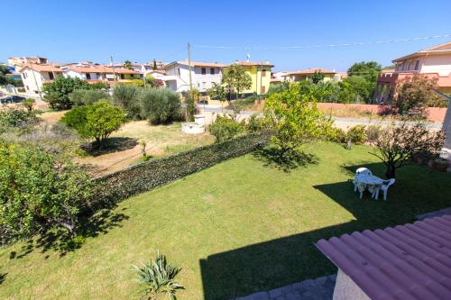  Appartamenti in Villa con ampio giardino esterno in Posada