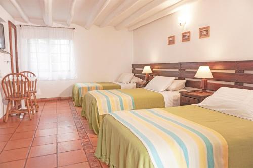 Superior Quadruple Room room in Hotel y Spa Getsemani