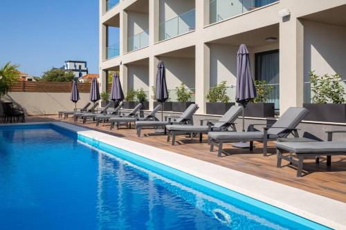 Ellure Luxury Suites - image 13
