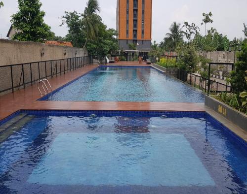 Collection O 92440 Urban Town Apartment Karawang