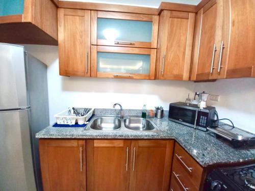 Your Space piscina, parque infantil, 3 habitaciones , Res Breezes Santiago Your Space piscina, parque infantil, 3 habitaciones , Res Breezes Santiago