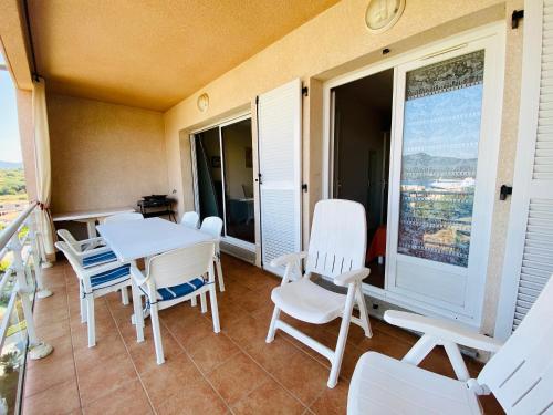 Balkon/terasa, A Funtana deux chambres, vue mer, piscine et tennis in Bartaccia