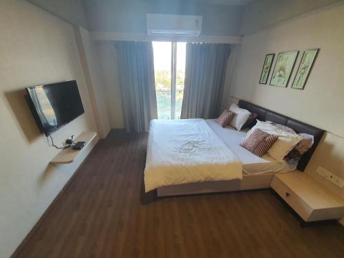 Weekend Address Managed By P.C Homes, Súrat (fotografie 9)