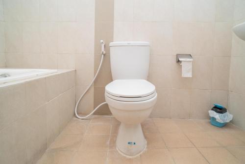 Urbanview Hotel de Kopen Malang by RedDoorz Room Type - Deluxe Double Room