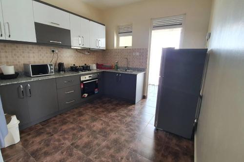 Charming 2-Bed Apartment in Kigo - image 4