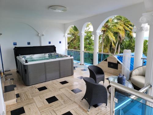 Bañera de hidromasaje, casaenjoysamana in Punta Balandra