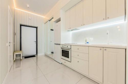 1 room 50m2 center of Obolon near River side. Smart Plaza in โอโบลอนสกี