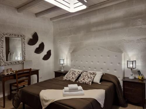 Il trullo delle nonne dei Giardini di Marzo chambre d'hôte Felline