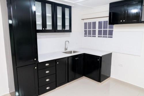 Kitchen, Francis Nook St Joseph Room in Port Of Spain