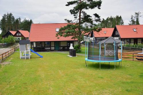 Pastelowy Domek z balią elektryczną z jacuzzi