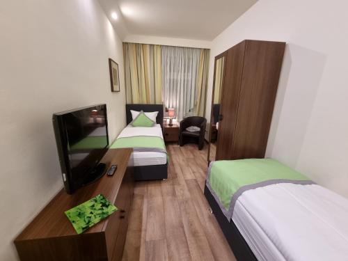 Auenwald Hotel und Apartmenthaus - image 2