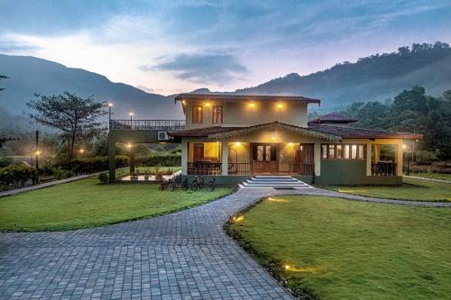 SaffronStays Ambaram - 3BR countryside villa with verandah, bonfire & riverside trails near Imagica & Pali Temple - Admal