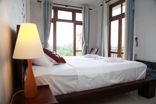 Deluxe Double Room with Balcony room in Chathu Holiday Home