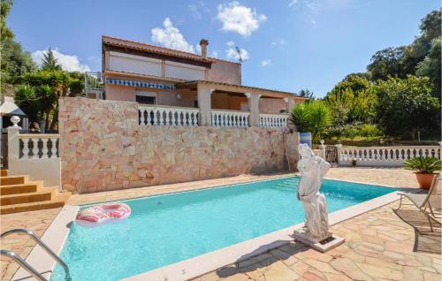 Stunning apartment in Bastelicaccia with 2 Bedrooms, WiFi and Swimming pool